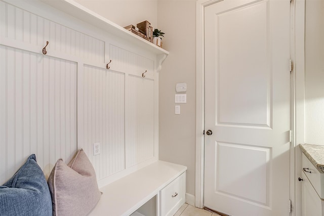 mudroom with light tile patterned floors