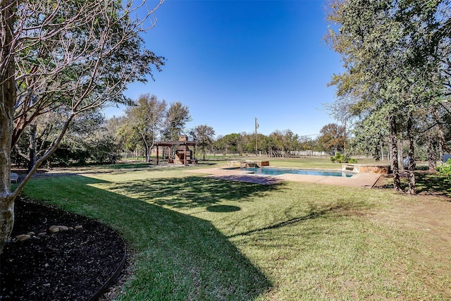 view of yard with a playground