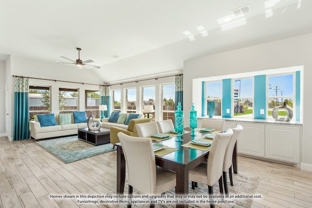 dining room featuring light hardwood / wood-style floors, ceiling fan, and plenty of natural light