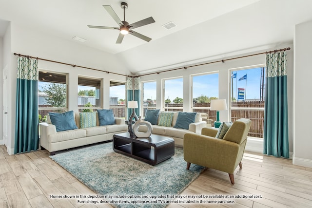 living room featuring light wood-type flooring, vaulted ceiling, and ceiling fan