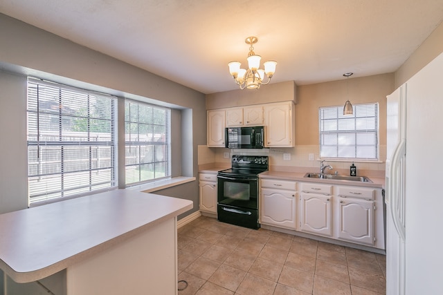 kitchen with white cabinetry, sink, black appliances, kitchen peninsula, and decorative light fixtures