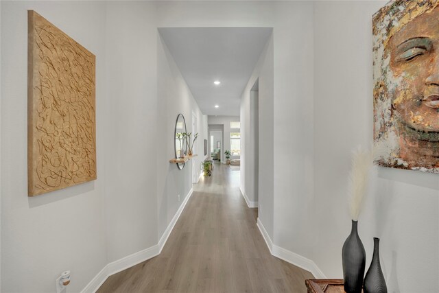 corridor featuring light hardwood / wood-style flooring