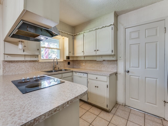 kitchen featuring sink, a textured ceiling, light tile patterned floors, black electric stovetop, and exhaust hood