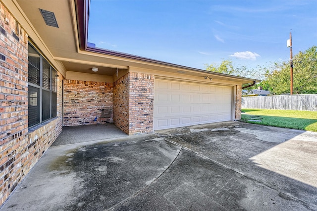 garage with a yard