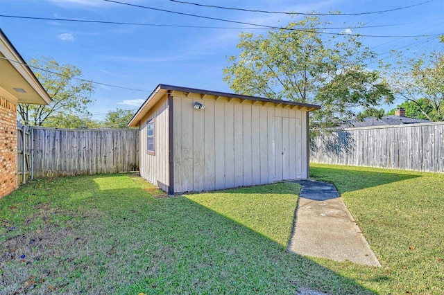 view of outdoor structure with a lawn