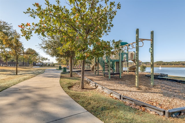 view of playground featuring a water view