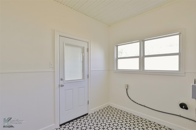 washroom featuring wooden ceiling and hookup for an electric dryer