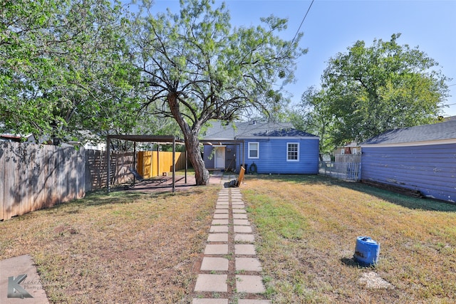 exterior space with a yard