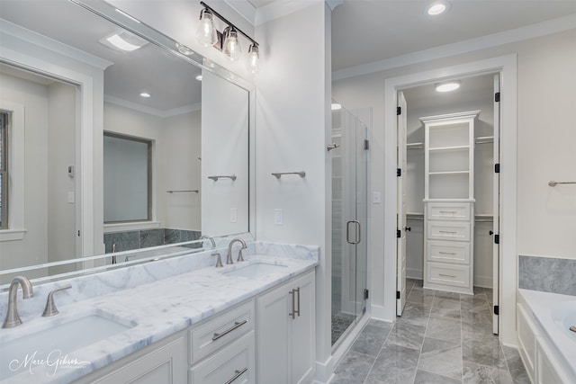 bathroom featuring independent shower and bath, vanity, and crown molding