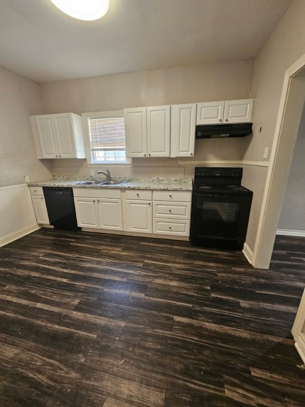 kitchen with black appliances, white cabinetry, dark wood-type flooring, and sink