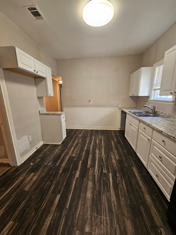 kitchen with white cabinetry, dark hardwood / wood-style flooring, and sink