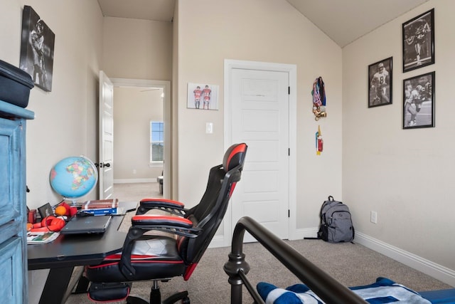 office area featuring carpet floors and lofted ceiling