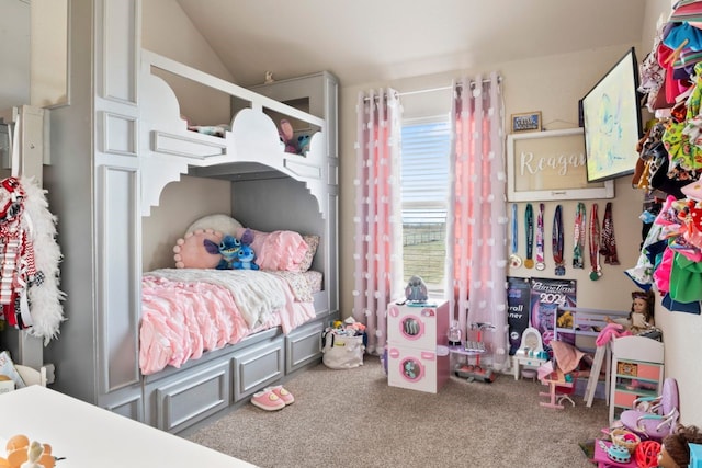 bedroom with carpet and vaulted ceiling