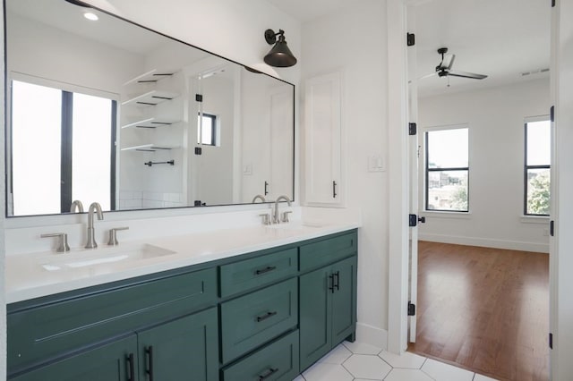 bathroom featuring vanity, hardwood / wood-style flooring, and ceiling fan