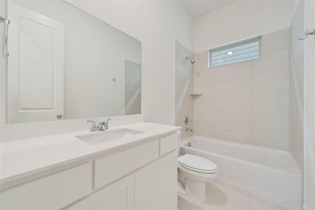 bathroom featuring vanity, toilet, and shower / bathtub combination