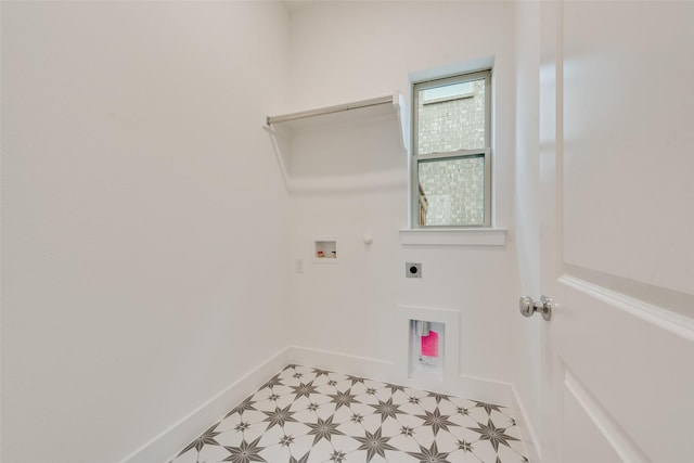 laundry area with laundry area, hookup for a gas dryer, tile patterned floors, hookup for an electric dryer, and washer hookup