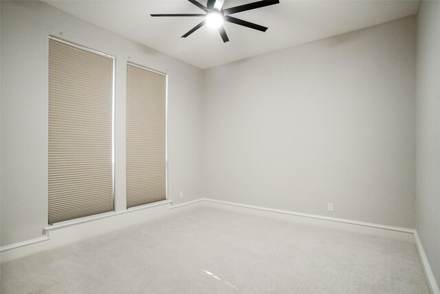 interior space with ceiling fan and carpet flooring