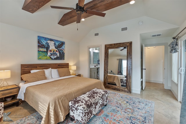 bedroom featuring ceiling fan, ensuite bath, and lofted ceiling