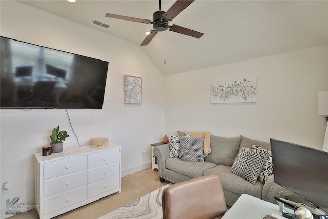 living room with ceiling fan and lofted ceiling