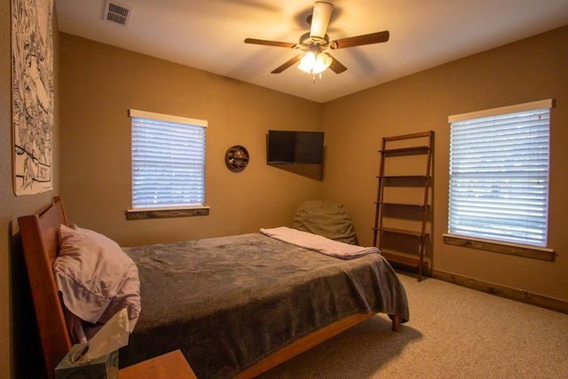 bedroom featuring ceiling fan and carpet flooring