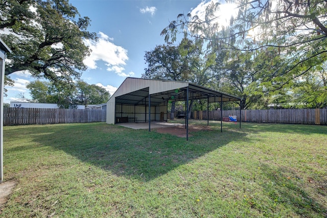 view of yard featuring a carport