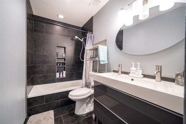 full bathroom featuring shower / tub combo with curtain, vanity, toilet, and tile patterned flooring