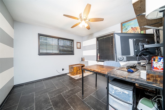 office space featuring ceiling fan