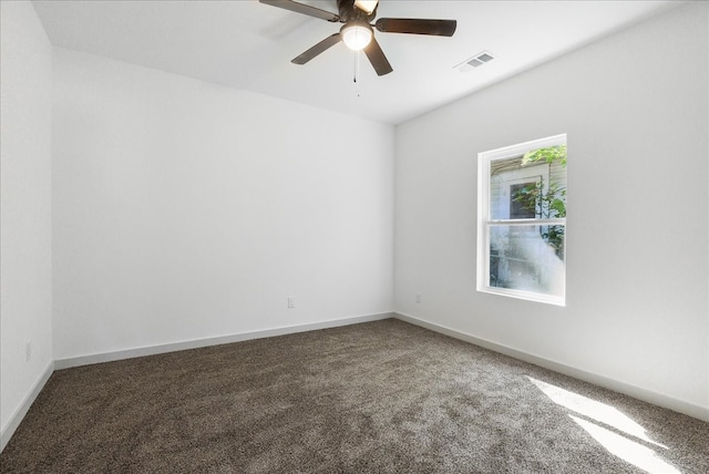 empty room featuring carpet and ceiling fan