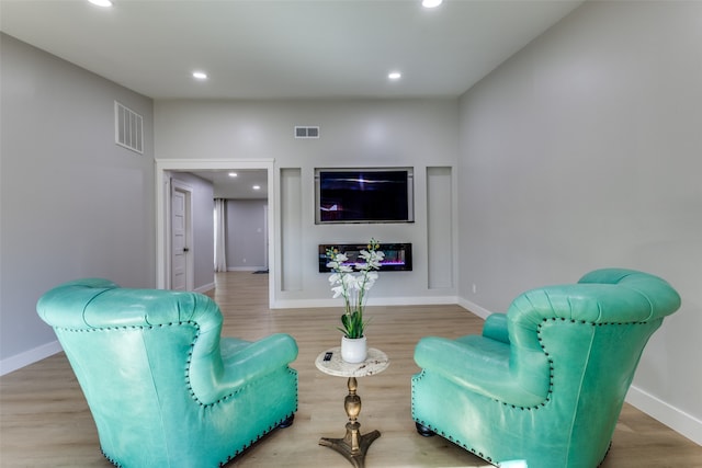 living room with hardwood / wood-style flooring