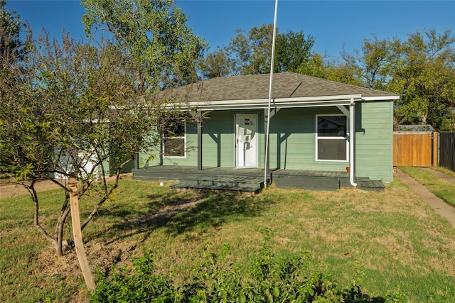 view of front of home with a front lawn and covered porch