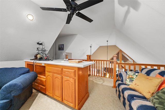 office space with lofted ceiling, light carpet, and ceiling fan