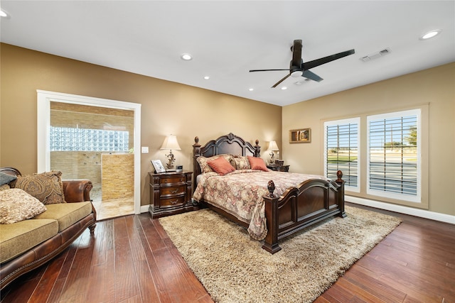 bedroom with ceiling fan and dark hardwood / wood-style floors