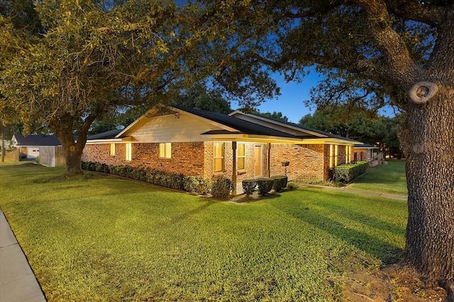 view of home's exterior featuring a lawn