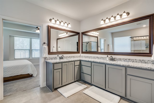 bathroom with vanity, ceiling fan, and tile patterned floors