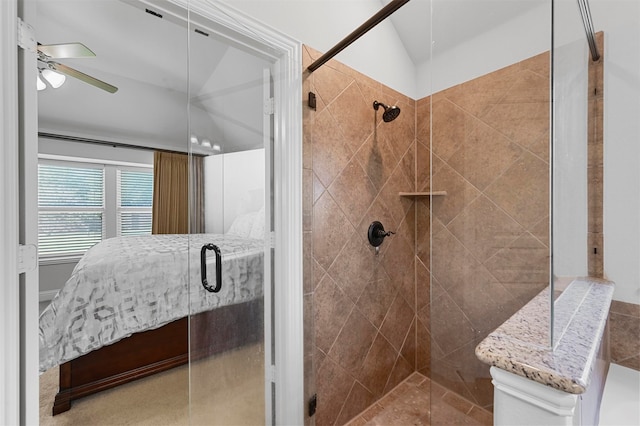 bathroom with walk in shower, ceiling fan, and lofted ceiling