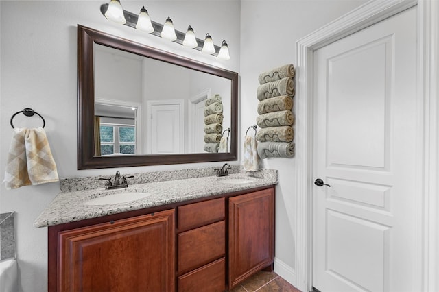 bathroom with vanity and tile patterned floors