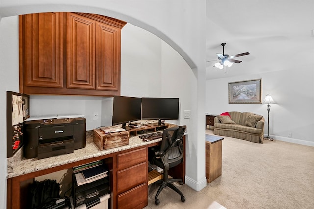 office with ceiling fan, light colored carpet, and vaulted ceiling