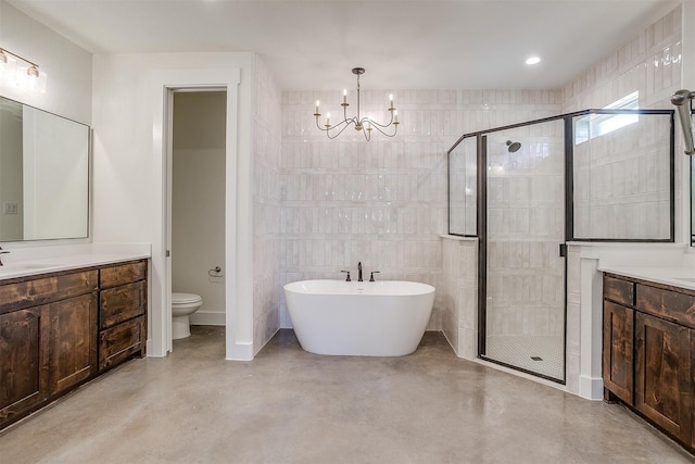 full bathroom featuring concrete floors, vanity, a chandelier, and tile walls