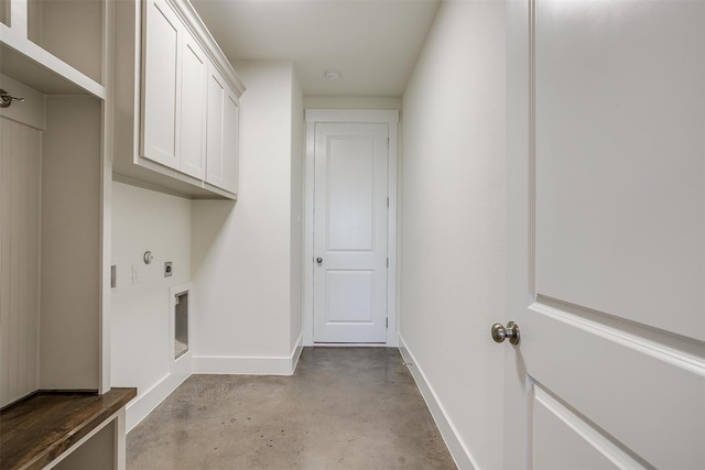 laundry room featuring cabinets and electric dryer hookup