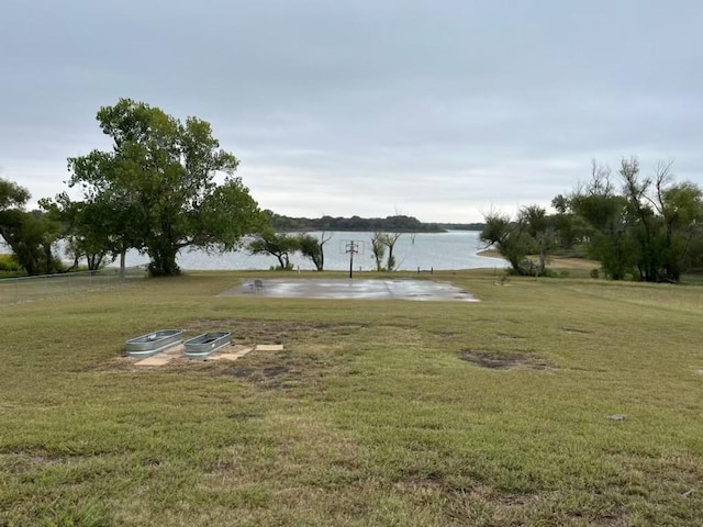 view of yard with a water view