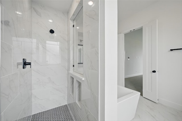 4029 Trellis Dr, Celina, TX 75078 - bathroom featuring a marble finish shower, a freestanding tub, marble finish floors, and baseboards