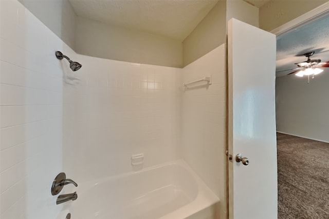 bathroom with tiled shower / bath combo, ceiling fan, and a textured ceiling