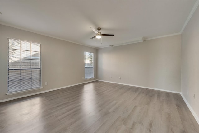 unfurnished room with ceiling fan, ornamental molding, and light hardwood / wood-style floors