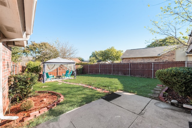 view of yard featuring a gazebo and a patio