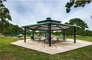 view of community featuring a yard and a gazebo