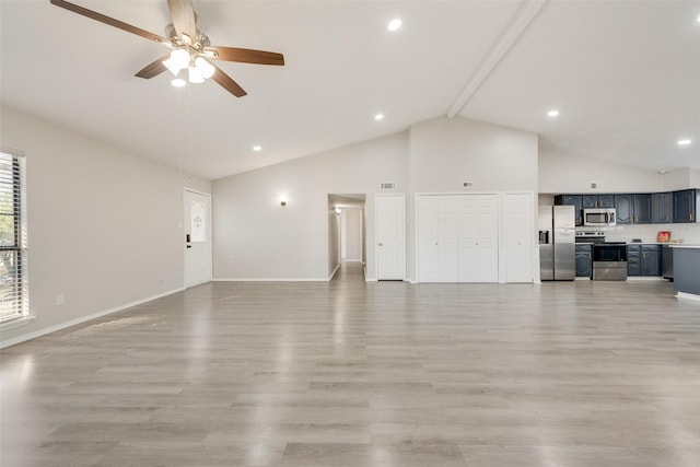 unfurnished living room with ceiling fan, light hardwood / wood-style flooring, and high vaulted ceiling