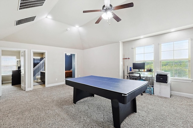 rec room with light carpet, ceiling fan, and vaulted ceiling