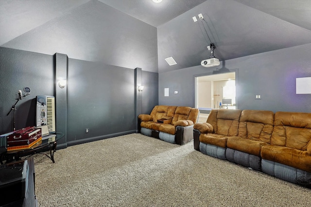 home theater featuring carpet and lofted ceiling