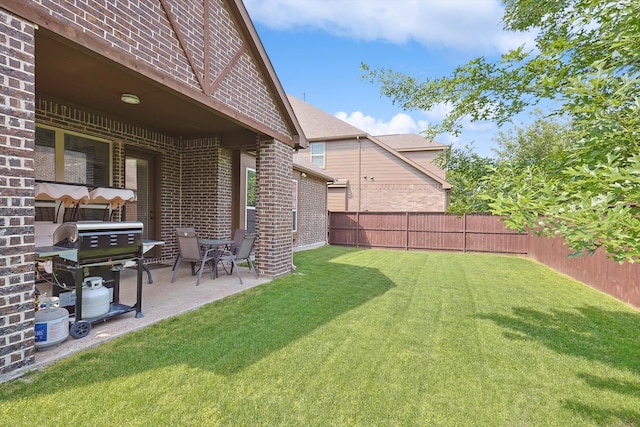 view of yard with a patio area