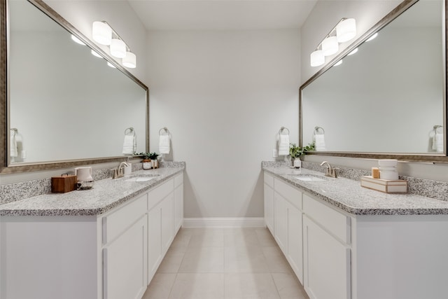 bathroom with vanity and tile patterned flooring